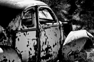 Vintage cars rust away inside the Desert Queen Ranch